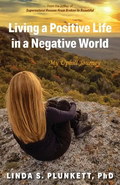 Living a Positive Life in a Negative World: My Uphill Journey - Paperback